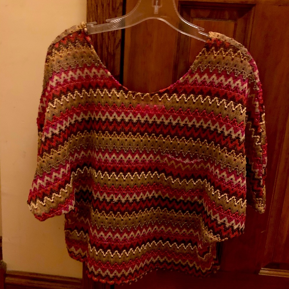 Beautiful unique overlay shirt.